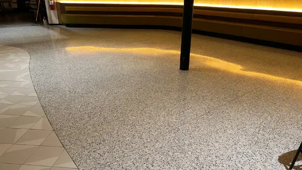 Commercial terrazzo floor final polished finish in Bellaire TX showing restored shine and surface clarity