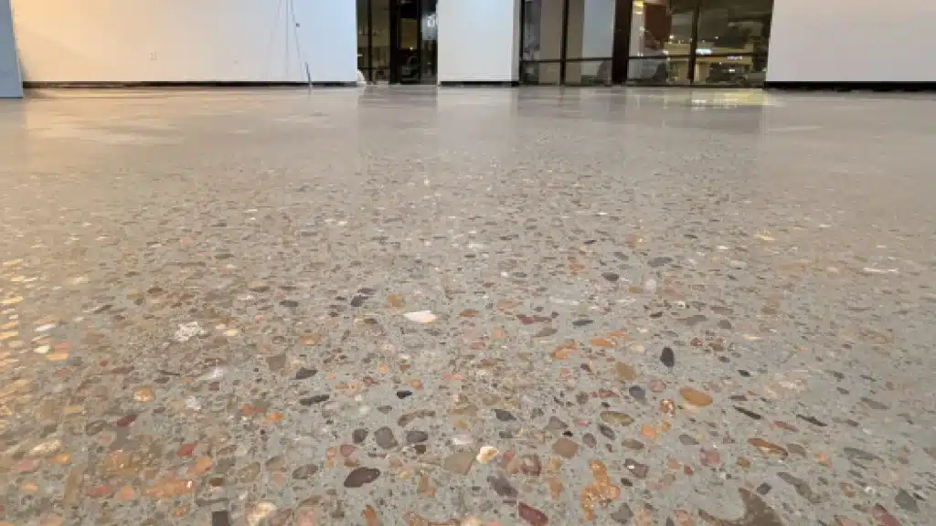 Low angle view of concrete floor polished to 800 grit and cleaned prior to guard application in Westchase Houston, TX.