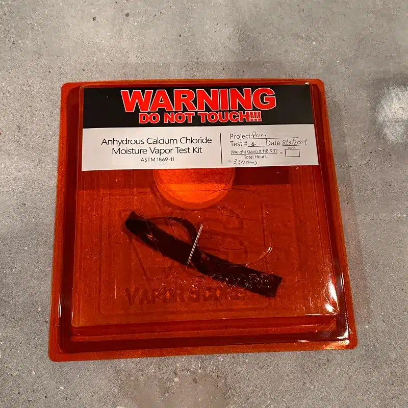 Concrete moisture vapor testing using calcium chloride test kit