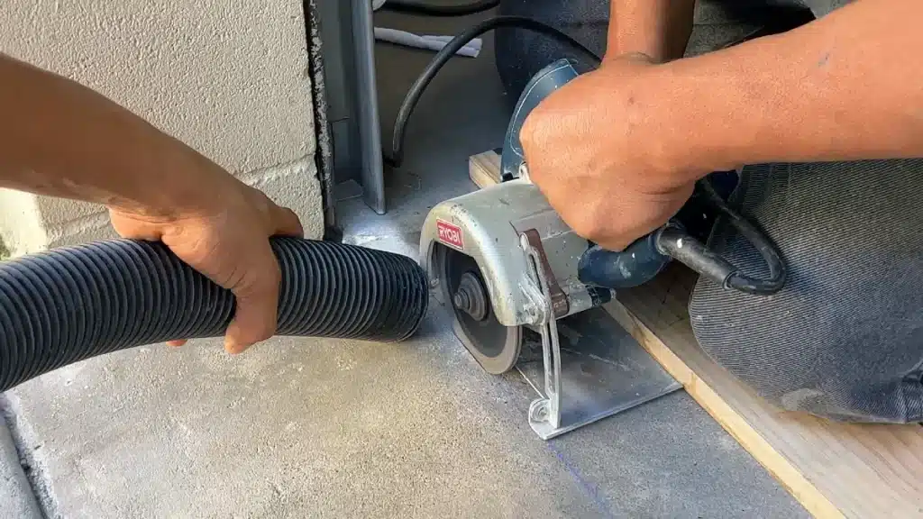 Cutting transition line into concrete slab prior to epoxy floor coating in Tomball TX