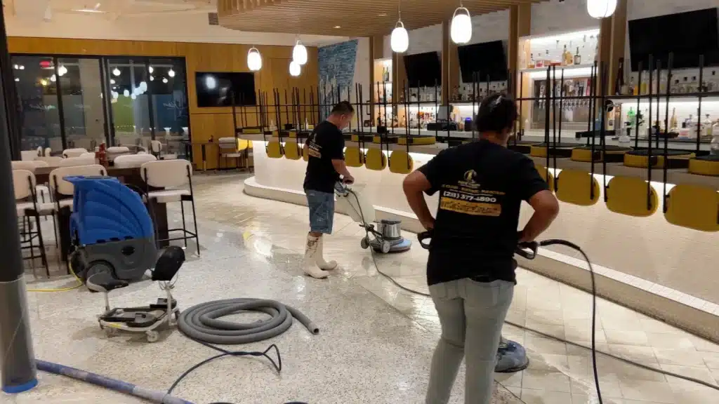 Commercial terrazzo floor after polishing in Bellaire TX dining room showing restored shine and clarity