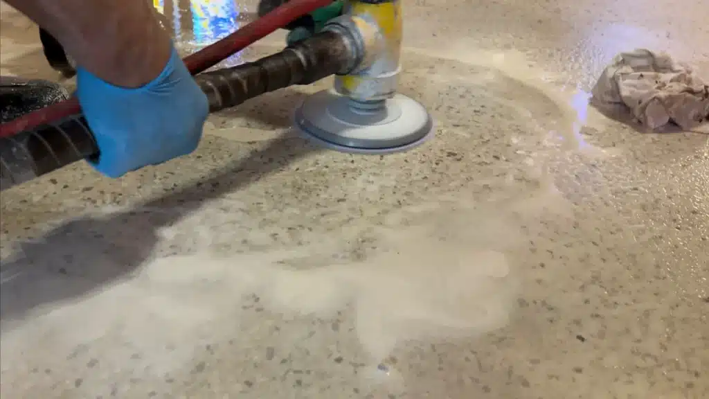 Terrazzo floor hole repair in progress at Immaculate Conception Church in Goliad, TX