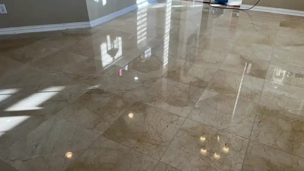 Marble floor in the kitchen after restoration, showing a clean, polished, and uniform finish.