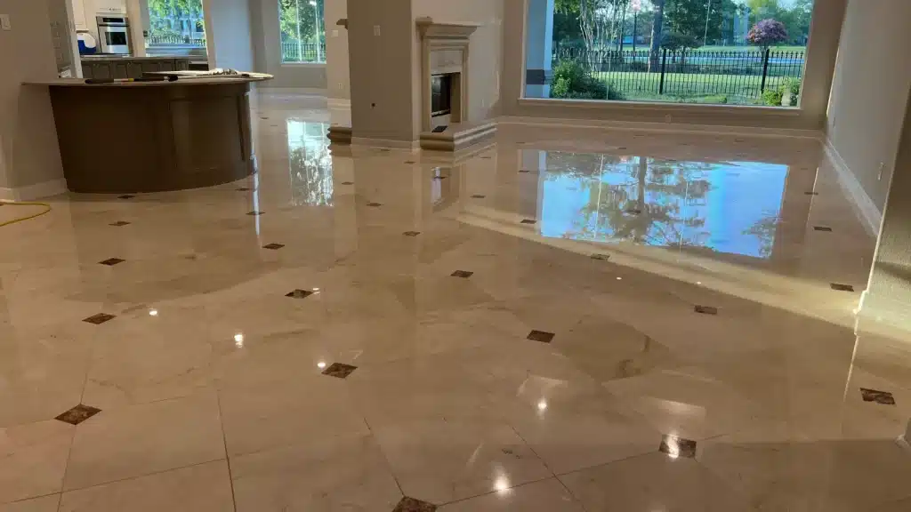 Wide view of restored residential marble floor showing uniform finish and clear light reflection in Royal Oaks, Houston, Texas.