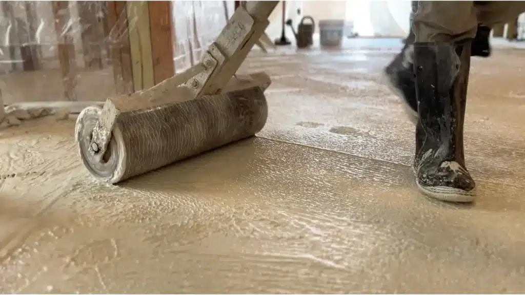 New terrazzo section being installed during restoration to replace previously damaged area.