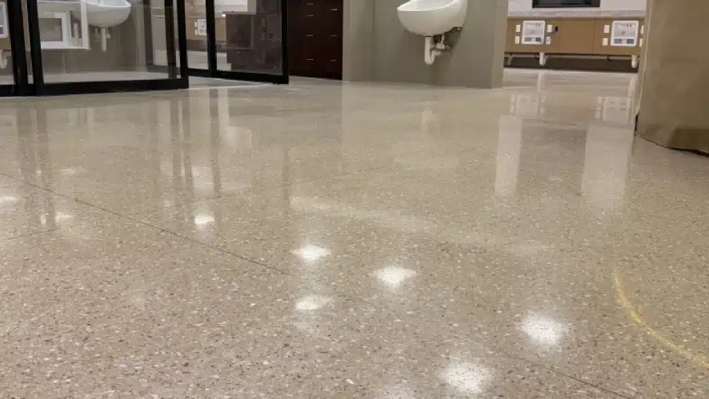 Epoxy terrazzo floor after semi-gloss mechanical restoration in Pearland TX medical facility