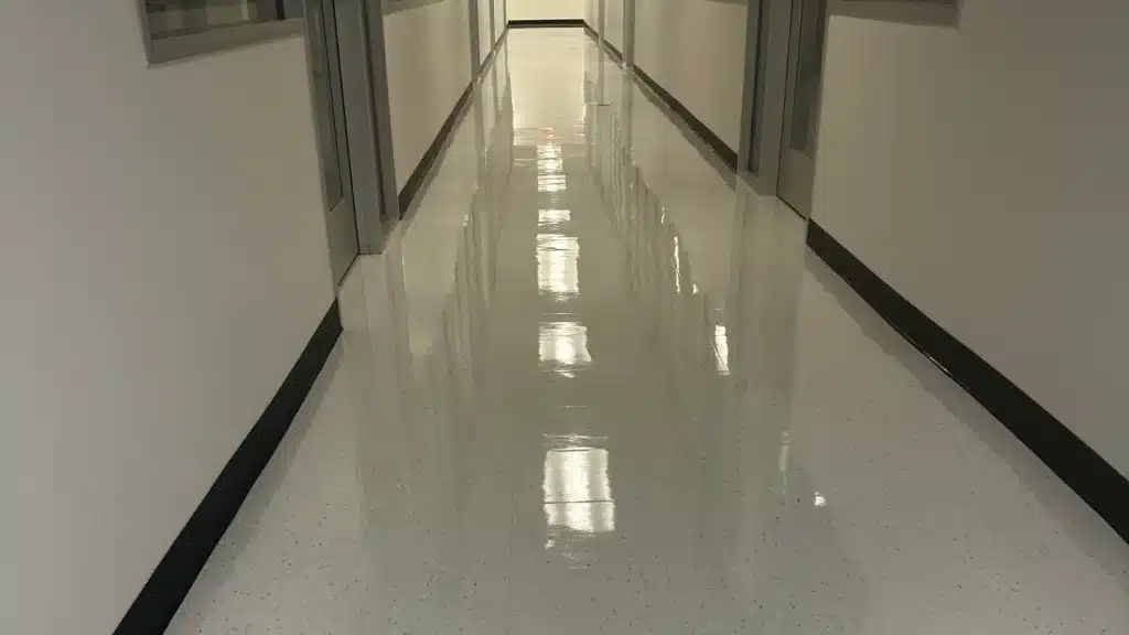 VCT Floor Maintenance in Forensic Facility Hallway