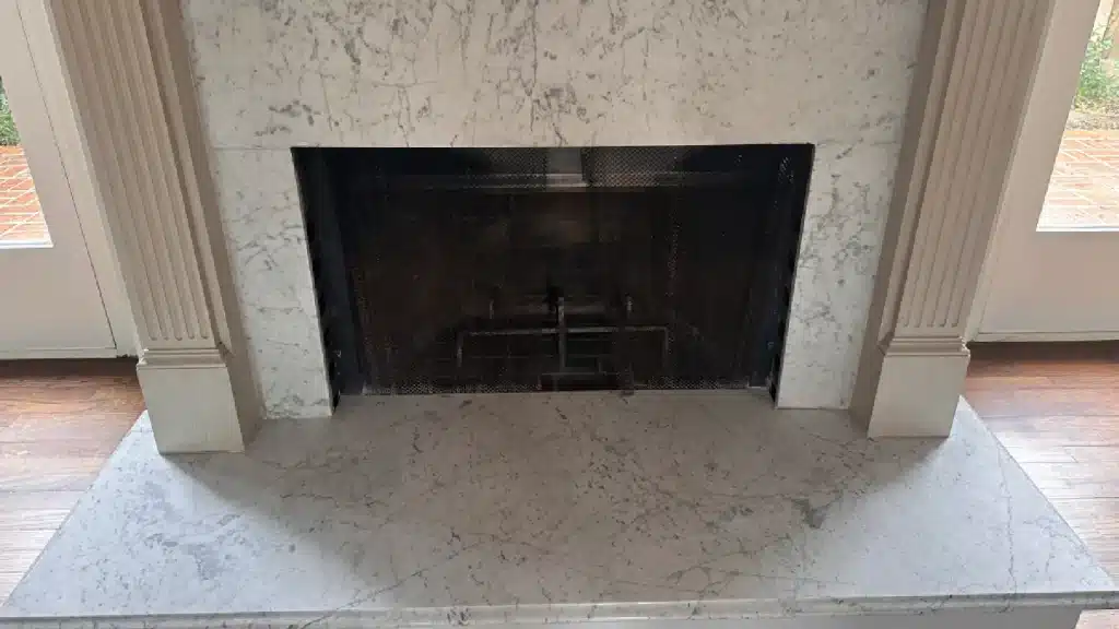 marble fireplace surround and hearth with natural stone slab