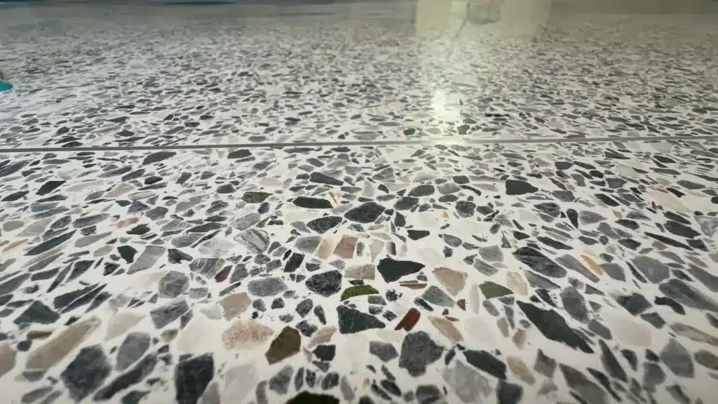 Close up of polished terrazzo aggregate showing detailed stone blend in Houston TX